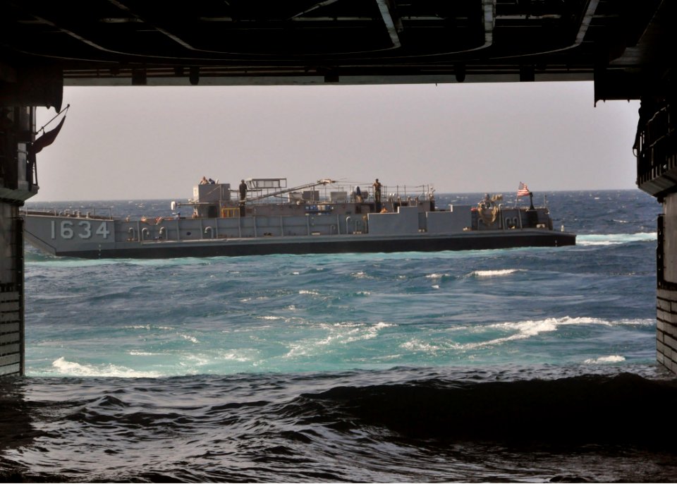 US Navy 100824-N-3620B-001 A landing craft utility (LCU) launches from the well deck of USS Denver (LPD 9)