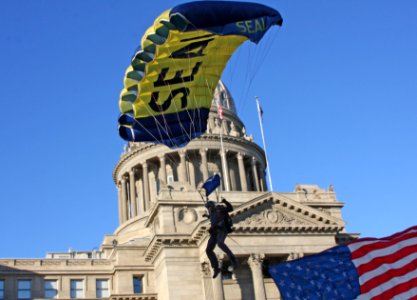 US Navy 100825-N-0000X-226 Members of the U.S. Navy parachute demonstration team, the Leap Frogs, parachute in front of the Idaho State capitol building during Boise Navy Week, one of 20 Navy Weeks planned across America for 20