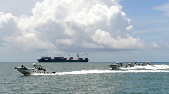 US Navy 100825-N-8546L-276 Fuerza especial naval sailors guide their patrol boats in an echelon formation to demonstrate techniques they learned while training with the Maritime Civil Affairs and Security Training Command