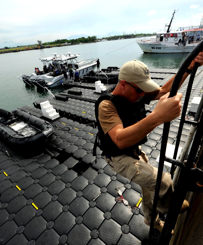 US Navy 100825-N-8546L-039 Master-at-Arms 1st Class Paul N. Francois II prepares to board a Fuerza Especial Naval (FEN) of the Guatemalan Navy maritime patrol boats