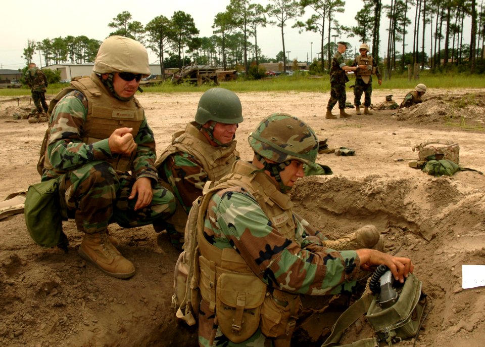 US Navy 100825-N-8816D-091 Seabees assigned to Naval Mobile Construction Battalion (NMCB) 133 set up communications equipment for their two-person