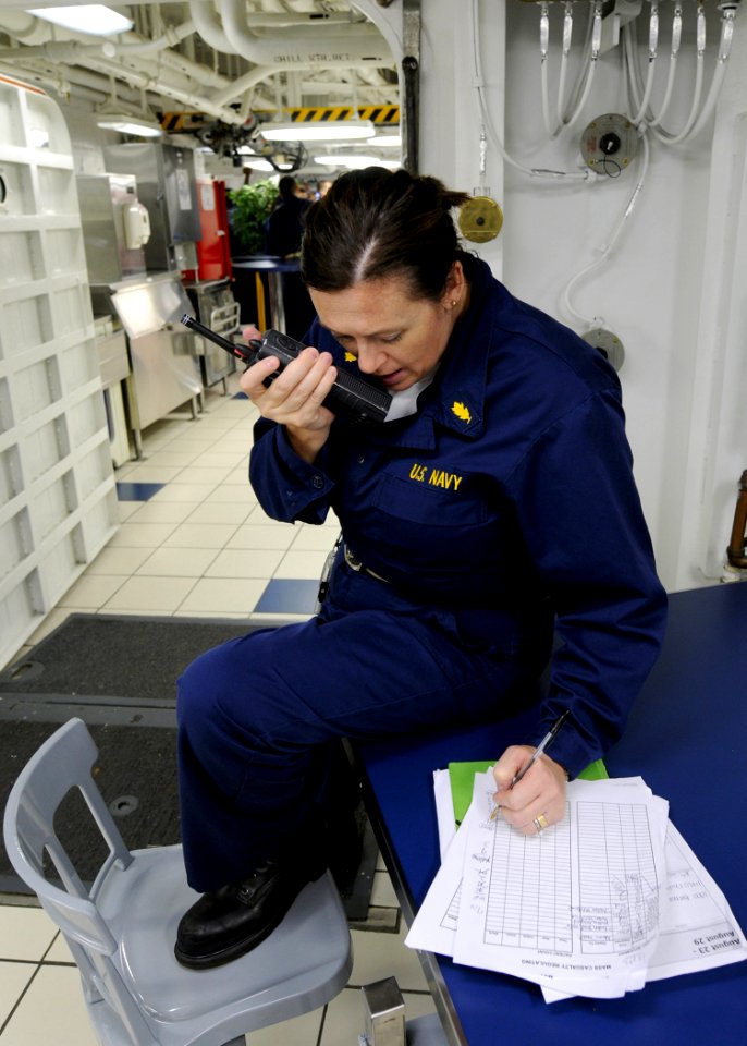 US Navy 100826-N-2686K-409 Lt. Cmdr. Carrie L. Dreyer communicates the status of wounded patients during a mass casualty drill