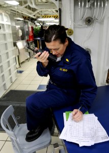 US Navy 100826-N-2686K-409 Lt. Cmdr. Carrie L. Dreyer communicates the status of wounded patients during a mass casualty drill