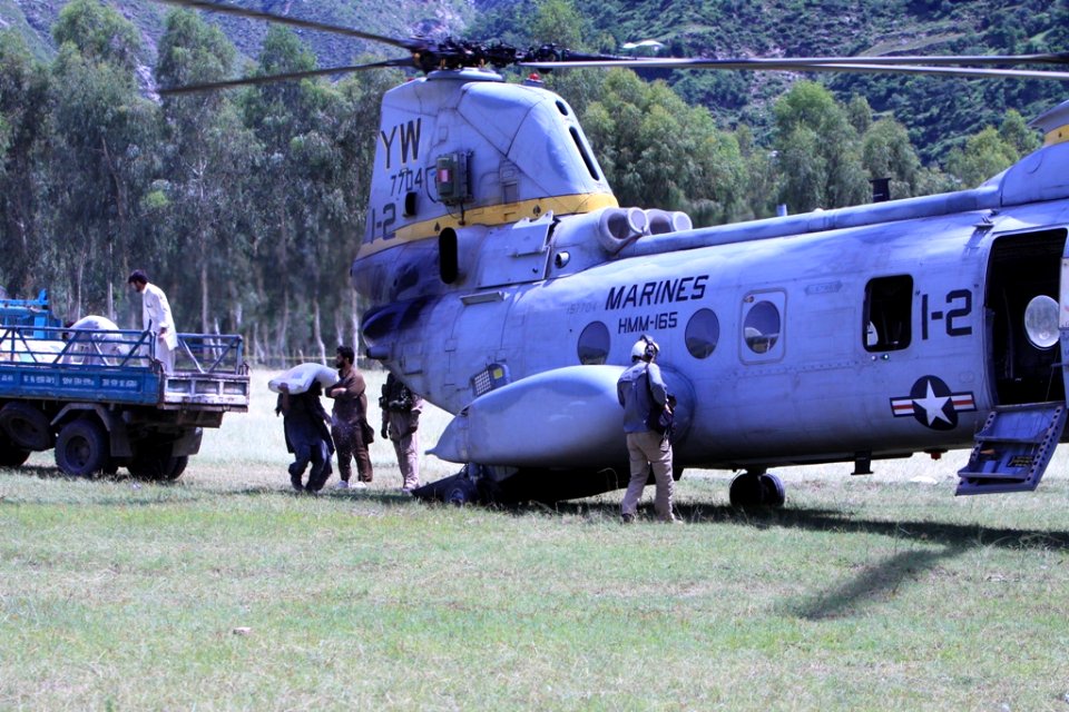 US Navy 100827-M-3497D-619 Pakistani volunteers load relief supplies onto a Marine Corps CH-46E Sea Knight helicopter uring humanitarian relief efforts in Khyber-Pakhtunkhwa Province, Pakistan