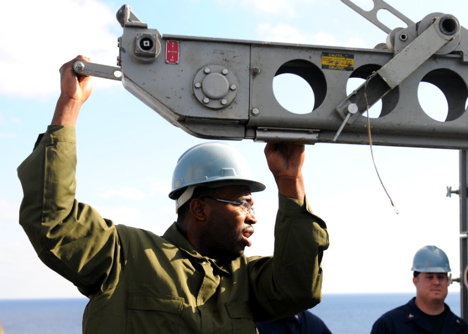 US Navy 100831-N-2908M-003 Fire Controlman 2nd Class Jovan Barber loads the forward NATO Sea Sparrow mount aboard the amphibious assault ship USS Kearsarge (LHD 3)