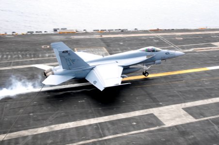 US Navy 100827-N-2918M-052 An F-A-18E Super Hornet lands aboard USS Nimitz (CVN 68) photo