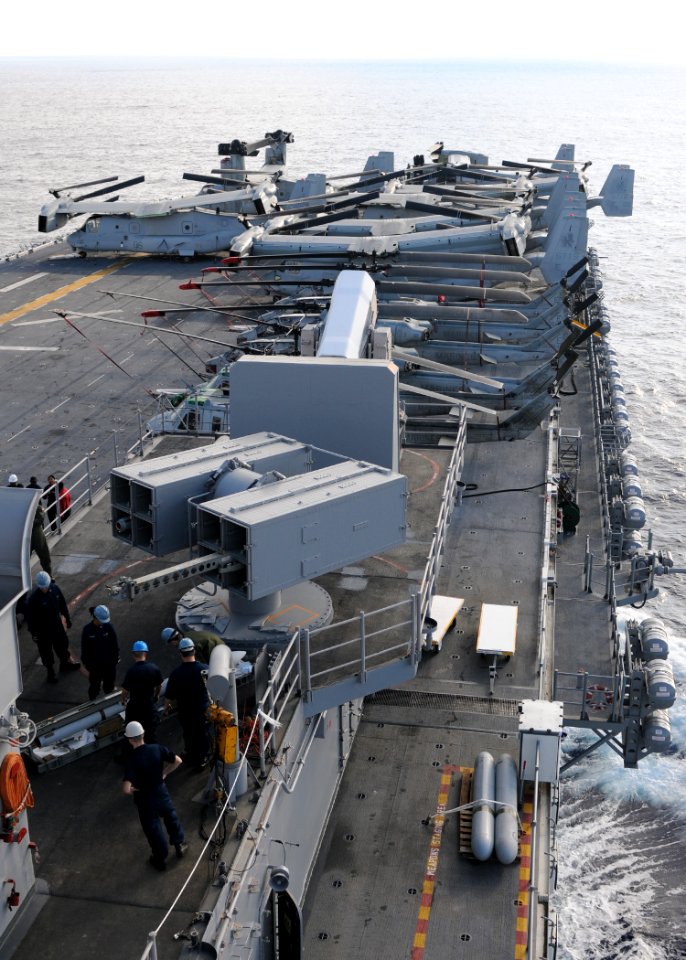 US Navy 100831-N-2908M-001 Fire controlmen aboard the amphibious assault ship USS Kearsarge (LHD 3) load the forward NATO Sea Sparrow mount