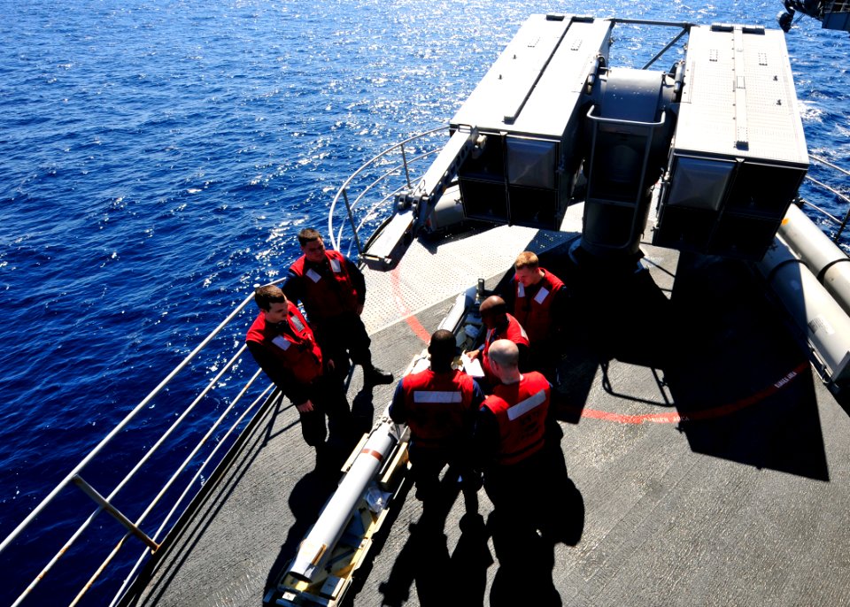 US Navy 100829-N-0569K-079 Sailors assigned to the combat systems department of the aircraft carrier USS Enterprise (CVN 65) assemble a ship-launched, intercept-aerial guided missile (RIM-7)
