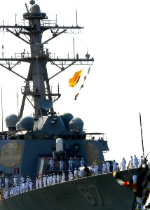 US Navy 100901-N-5292M-021 Sailors man the rails aboard the guided-missile destroyer USS Cole (DDG 67) as the ship returns from a 7-month deployment two days earlier than planned due to Hurricane Earl