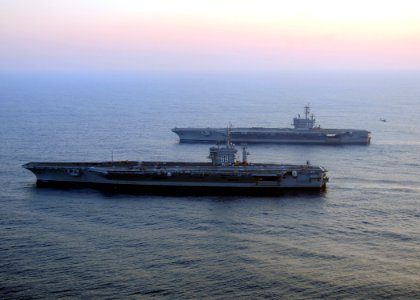 US Navy 100831-N-3885H-091 The aircraft carriers USS George H.W. Bush (CVN 77) and USS Dwight D. Eisenhower (CVN 69) conduct a vertical replenishment