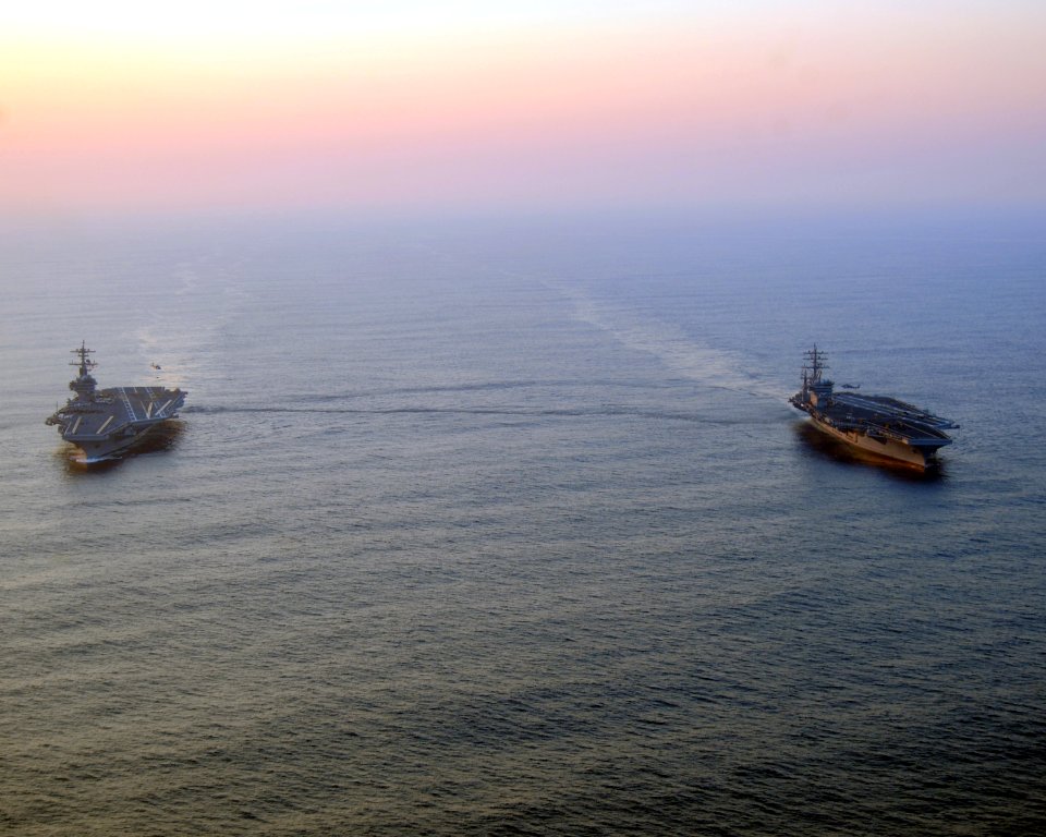 US Navy 100831-N-3885H-019 The aircraft carriers USS George H.W. Bush (CVN 77) and USS Dwight D. Eisenhower (CVN 69) conduct a vertical replenishment