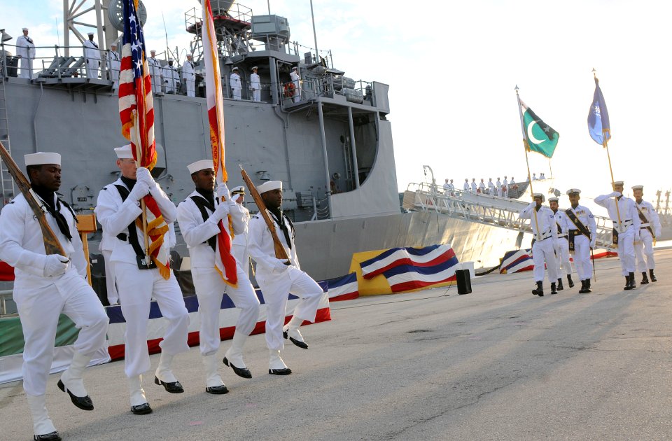 US Navy 100831-N-5812W-005 U.S. and Pakistani Sailors parade both their country's colors during the decommissioning ceremony of USS McInerney (FFG 8) at Naval Station Mayport