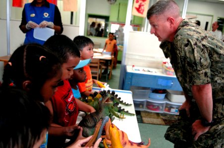 US Navy 100830-N-9818V-333 Master Chief Petty Officer of the Navy (MCPON) Rick West talks with children at the Child Development Center during his visit to Fleet Activities Yokosuka