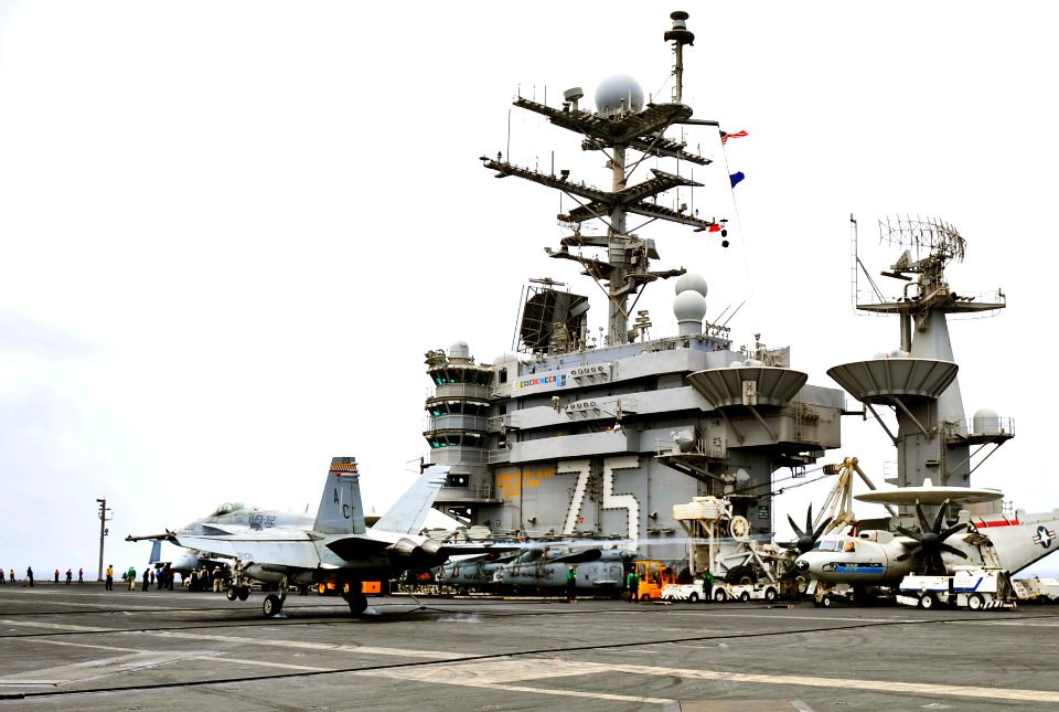US Navy 100831-N-6003P-100 An F-A-18C Hornet assigned to the Checkerboards of Marine Fighter Attack Squadron (VMFA) 312 lands aboard the aircraft carrier USS Harry S. Truman (CVN 75)