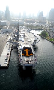 US Navy 100901-N-9500T-004 Chief petty officers and chief petty officer selectees form an anchor on the flight deck of the USS Midway Museum in obs
