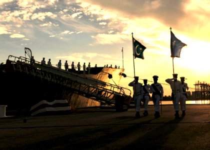 US Navy 100831-N-8590G-005 Pakistan sailors parade their country's colors during the decommissioning ceremony of USS McInerney (FFG 8) at Naval Station Mayport