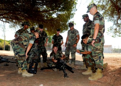 US Navy 100904-N-6357K-011 Sailors receive training on a machine gun