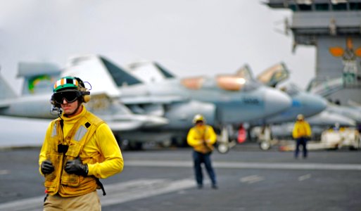 US Navy 100905-N-6003P-061 Lt. Daniel Decicco stands by for the next aircraft to launch aboard USS Harry S. Truman (CVN 75)