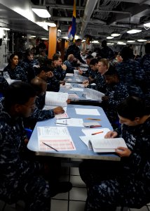 US Navy 100902-N-4973M-028 Sailors review their tests for advancement