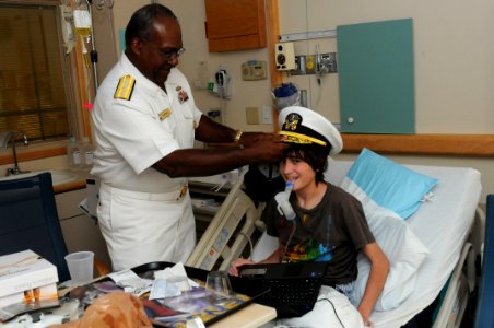 US Navy 100901-N-6736S-002 Rear Adm. Julius S. Caesar, right, vice director of Joint Concept Development ^ Experimentation at U.S. Joint Forces Command, visits a patient at Rainbow Babies ^ Children's Hospital photo