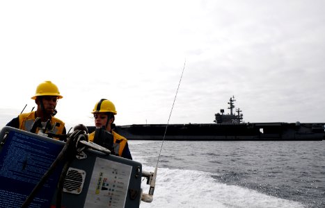 US Navy 100908-N-0232G-203 Boatswain's Mate 3rd Class Andrew Eller demonstrates the proper operation of a rigid-hull inflatable boat for Boatswain'