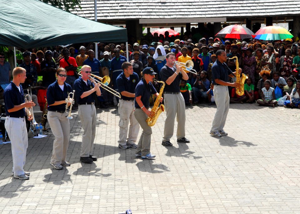 US Navy 100904-N-4044H-225 The U.S. Pacific Fleet Band performs in the town's local market. The band is embarked aboard the Royal Australian Navy landing ship heavy HMAS Tobruk (L50)