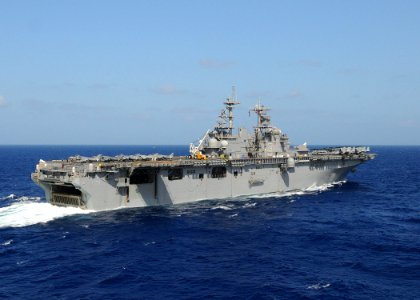 US Navy 100907-N-8069G-364 USS Kearsarge (LHD 3) cruises past USS Carter Hall (LSD 50) as it moves into position for a column maneuver exercise in