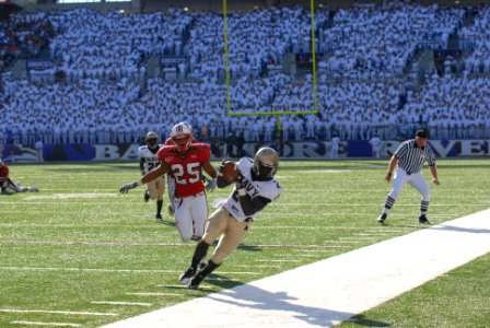 US Navy 100906-N-3857R-002 Navy Slot back Andre Byrd pulls down a reception in the 2nd quarter