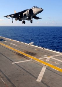 US Navy 100902-N-9950J-323 An AV-8B Harrier jet aircraft lands aboard the forward-deployed amphibious assault ship USS Essex (LHD 2) during the fly-on of the 31st Marine Expeditionary Unit (31st MEU) Aviation Combat Element