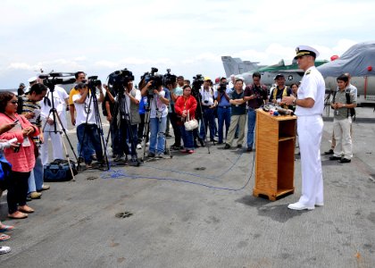 US Navy 100904-N-7103C-037 Capt. David A. Lausman, commanding officer of the aircraft carrier USS George Washington (CVN 73), conducts a press conference to discuss the ship's four-day port visit in the Philippines