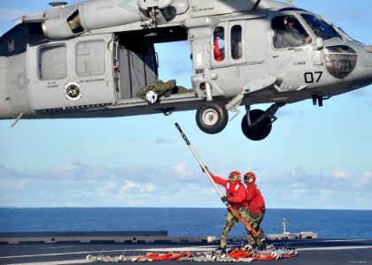 US Navy 100911-N-2013O-152 Aviation Ordnanceman 3rd Class Marquis Bagley, left, from Columbia, S.C., and Aviation Ordnanceman Airman Lamarcus Morga