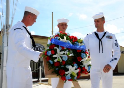 US Navy 100911-N-1906L-002 Sailors place a wreath to commemorate the victims of the Sept. 11, 2001 terrorist attacks photo