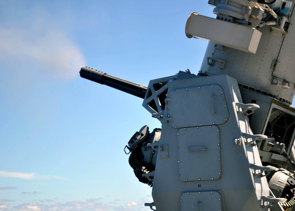 US Navy 100909-N-3620B-029 he amphibious transport dock ship USS Denver (LPD 9) conducts a Close-In Weapon System (CIWS) pre-aim calibration fire e