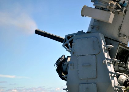 US Navy 100909-N-3620B-029 he amphibious transport dock ship USS Denver (LPD 9) conducts a Close-In Weapon System (CIWS) pre-aim calibration fire e