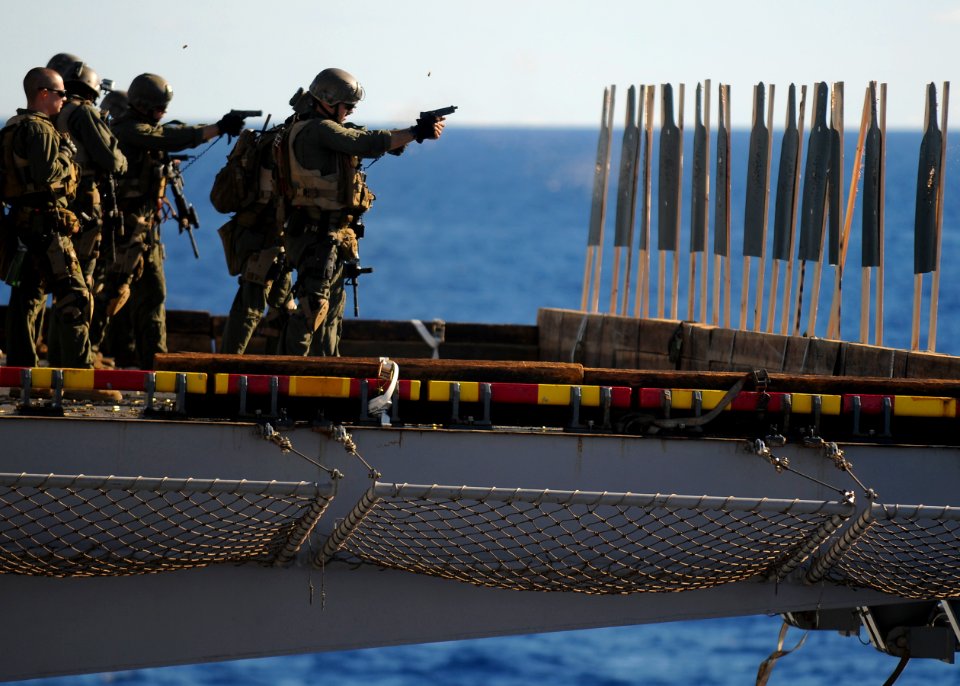 US Navy 100914-N-9950J-370 Marines assigned to the 31st Marine Expeditionary Unit (31st MEU) conduct a live-fire training exercise on the flight de