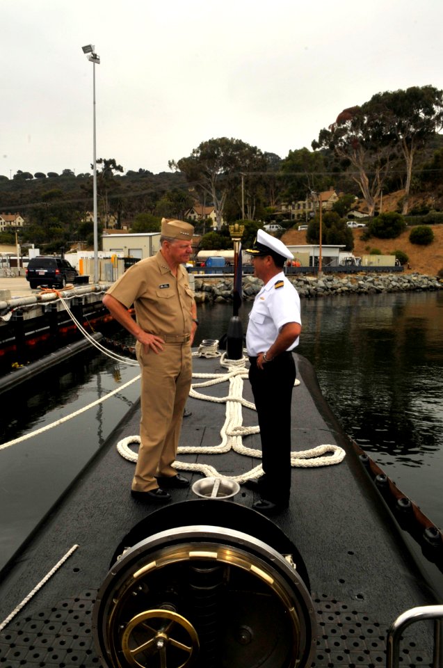 US Navy 100916-N-3548M-429 Chief of Naval Operations (CNO) Adm. Gary Roughead speaks with Cmdr. Juan Pablo Zuniga Alvayay, the commanding officer o