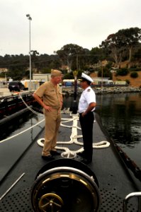 US Navy 100916-N-3548M-429 Chief of Naval Operations (CNO) Adm. Gary Roughead speaks with Cmdr. Juan Pablo Zuniga Alvayay, the commanding officer o