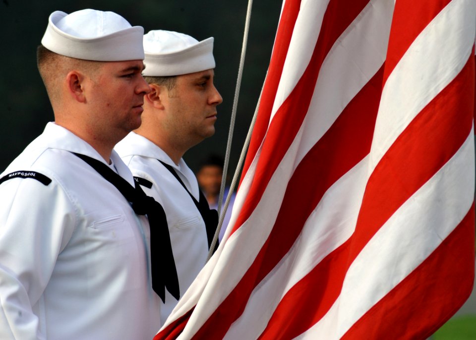 US Navy 100910-N-3925A-004 Aviation Electronics Technician 2nd Class Josh Coon, left, and Sonar Technician 2nd Class Phil Slocum
