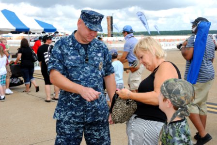 US Navy 100918-N-1580K-410 Master-at-Arms 1st Class Alan Keyes, a reserve component Sailor assigned to Naval Security Force Norfolk Naval Shipyard photo