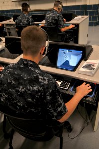 US Navy 100916-N-8848T-342 A recruit trains on the Virtual Environments for Ship and Shore Experiential Learning system at Recruit Training Command
