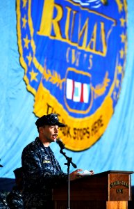 US Navy 100915-N-6003P-049 Capt. Joe Clarkson peaks to Sailors and Marines during the 9-11 Memorial Remembrance Ceremony aboard USS Harry S. Truman