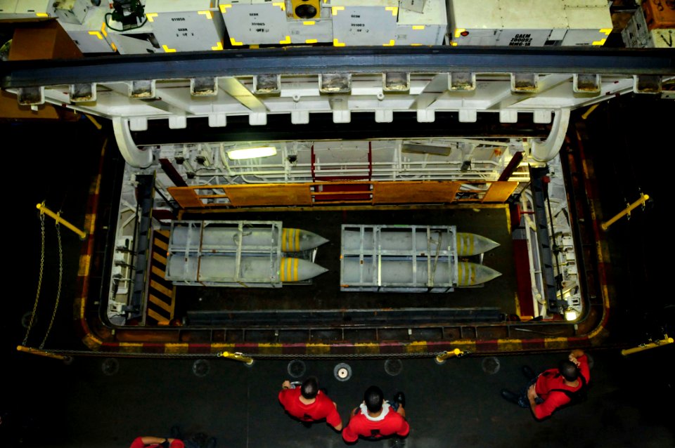 US Navy 100913-N-2918M-093 Sailors assigned to the Weapons Department aboard the aircraft carrier USS Nimitz (CVN 68)