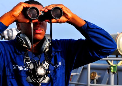 US Navy 100913-N-7948R-088 Sailor stands lookout aboard USS Pearl Harbor