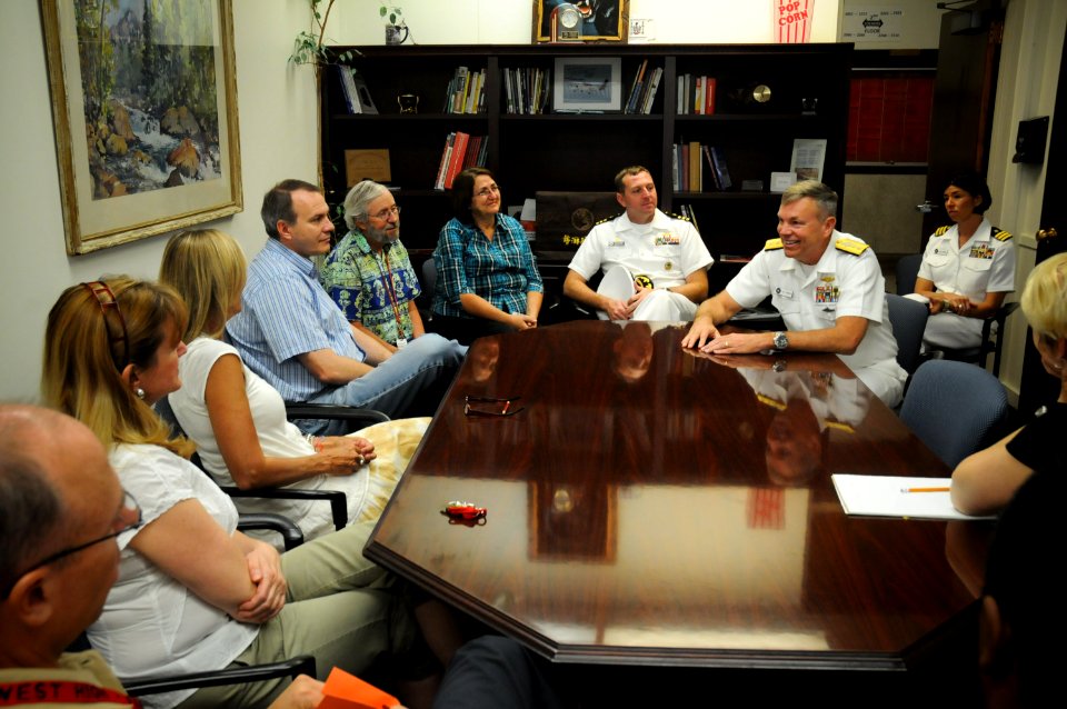 US Navy 100914-N-3271W-029 Rear Adm. William D. French, commander of Navy Region Southwest, speaks with student counselors at West High School duri