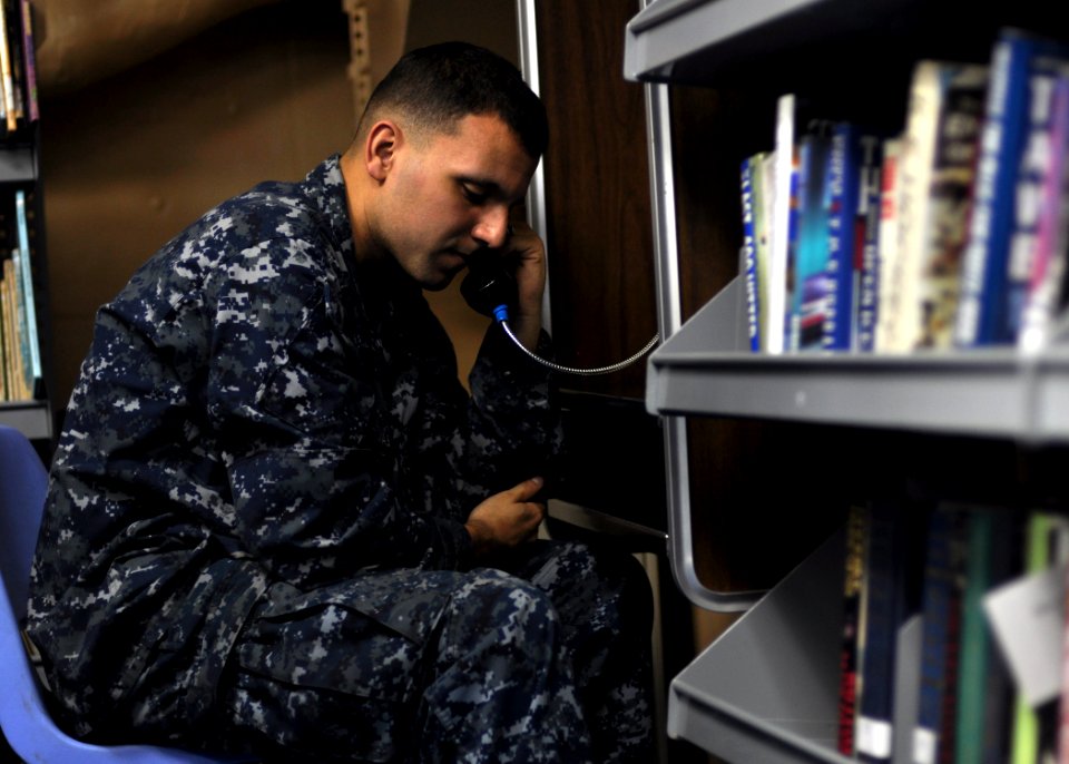 US Navy 100915-N-2013O-023 Sailor calls home aboard USS George Washington