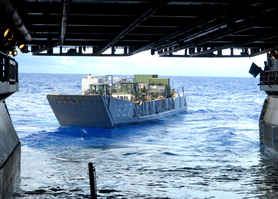 US Navy 100920-N-2218S-004 A landing craft utility departs the well deck of the amphibious assault ship USS Essex (LHD 2)