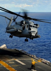 US Navy 100914-N-0120A-273 A CH-53E Sea Stallion helicopter assigned to Marine Medium Helicopter Squadron (HMM) 262, takes off from the forward-dep