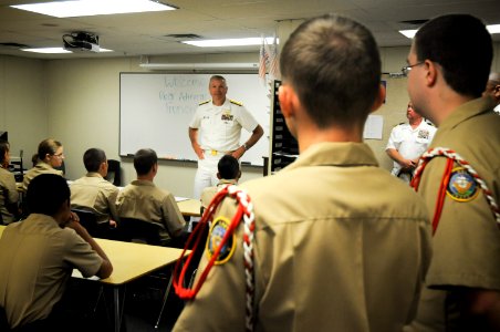 US Navy 100914-N-3271W-067 Rear Adm. William D. French, commander of Navy Region Southwest, speaks with Navy JROTC students at West High School