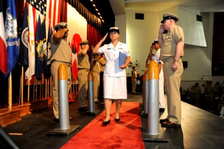 US Navy 100916-N-2858S-413 Honorary Chief Petty Officer Etsuko Nakamura is piped through side boys for the first time as a chief petty officer duri