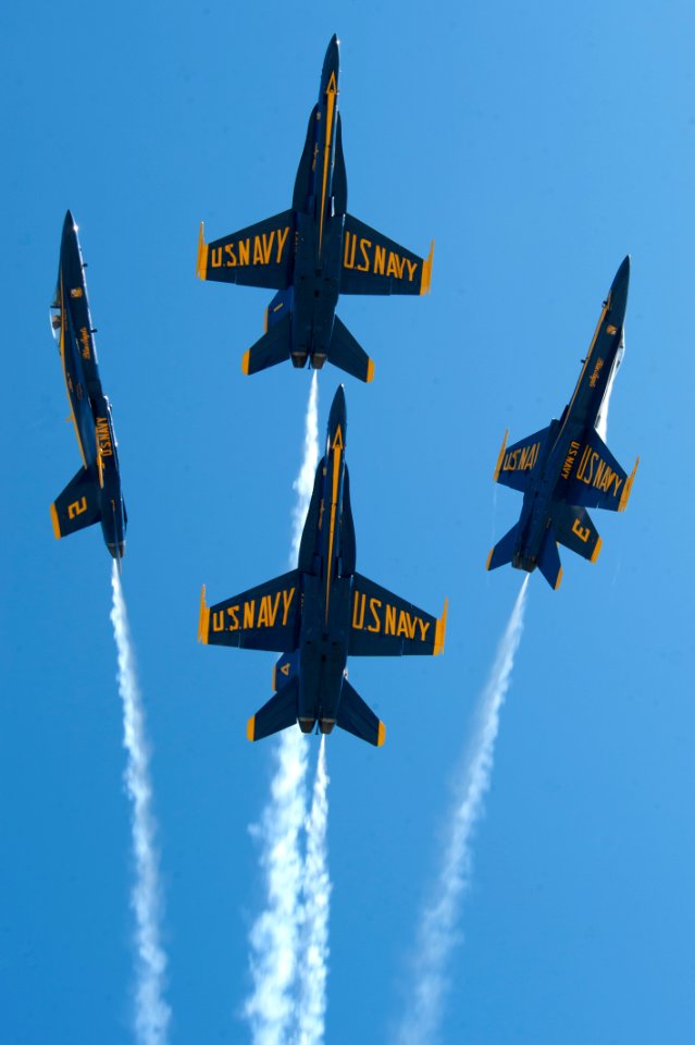 US Navy 100918-N-0092J-227 F-A-18 Hornets assigned to the U.S. Navy flight demonstration squadron, the Blue Angels, fly over Naval Air Station Ocea